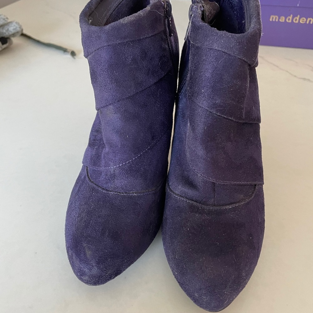 Used purple booties
